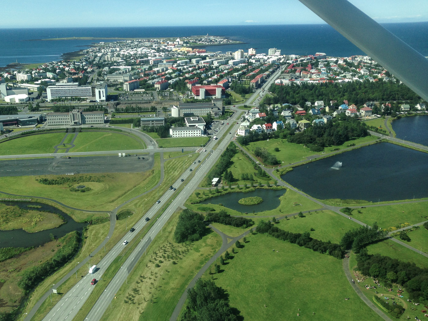 Reykjavík to Djúpavík. A flight ... - Hringbraut, Tjörnin lake. (30 July 2014)